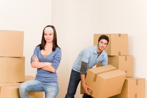 Loading furniture for pick-up in a busy central London area