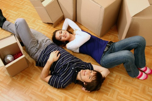 Professional movers handling packed belongings with care during a local move